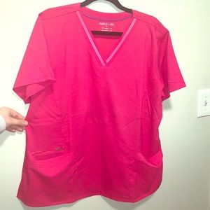 Purple label, pink scrub top
